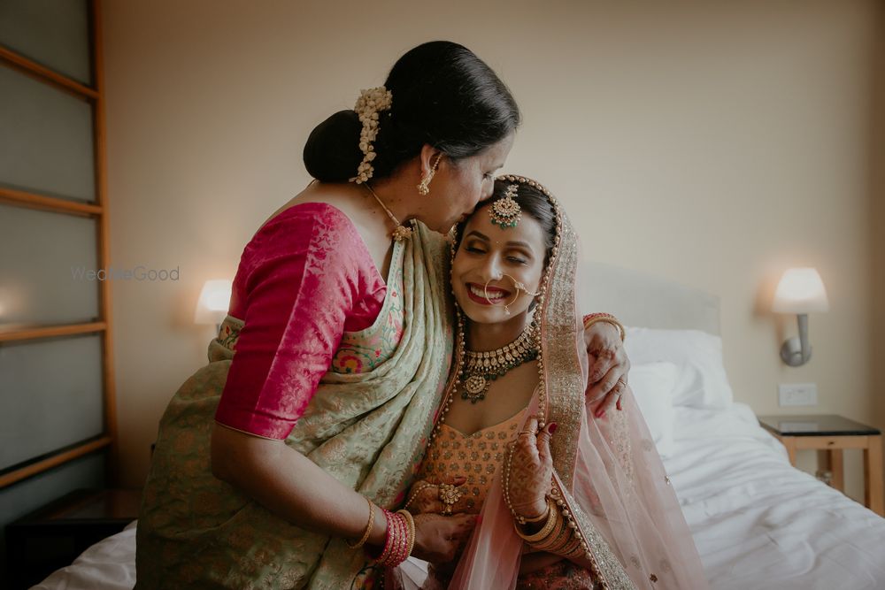 Photo of Am emotional moment between the mother and the bride.