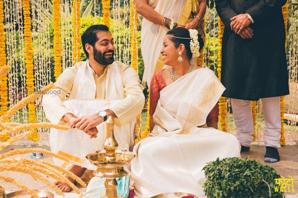 Photo of Couple Looking at Each Other Shot