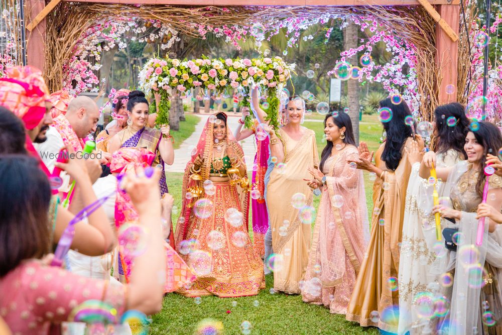 Photo of Bridal entry idea with guests blowing bubbles