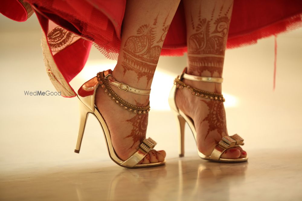 Photo of Gold Bridal Shoes with Anklets and Mehendi