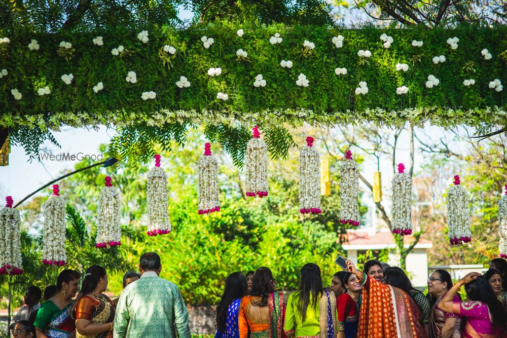 Photo of Mini White and Pink Floral Chandeliers