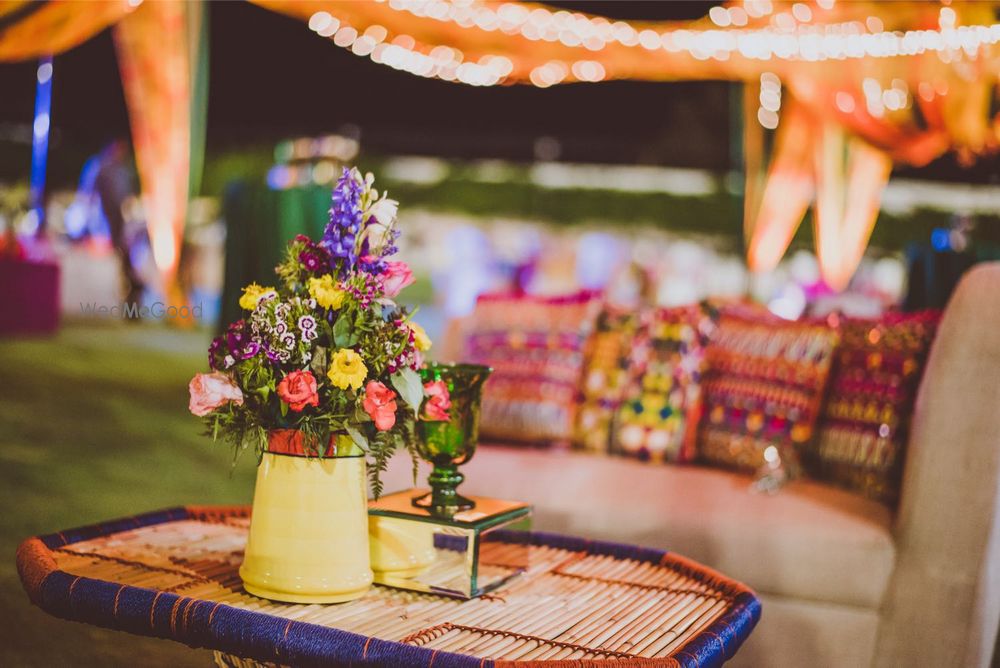 Photo of Yellow Flower Pot Table Centerpiece on Jute Table Decor