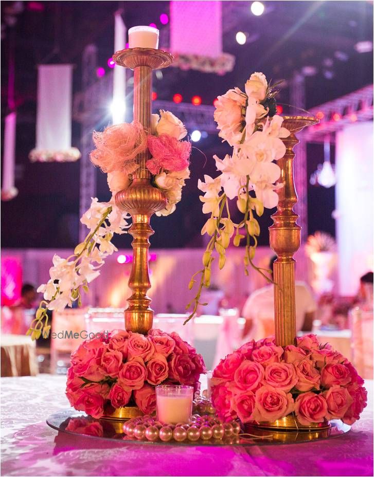 Photo of Gold Candelabras and Floral Centerpiece