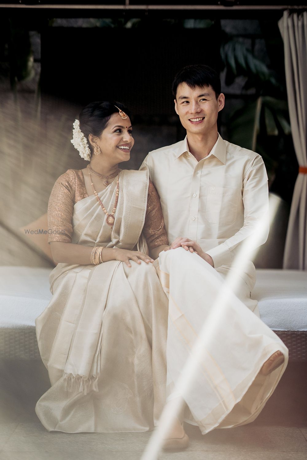 Photo of A romantic shot of the bride and groom at their candid best.