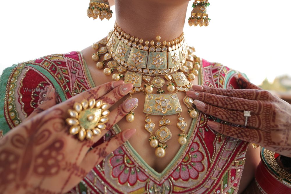 Photo of A close up shot of bride wearing contrasting jewellery