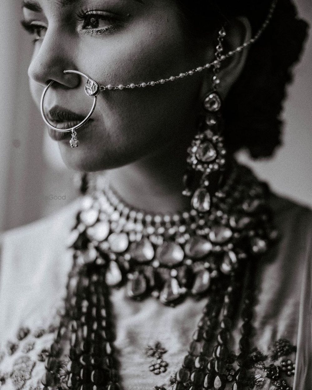 Photo of A close-up black and white shot of a bride.