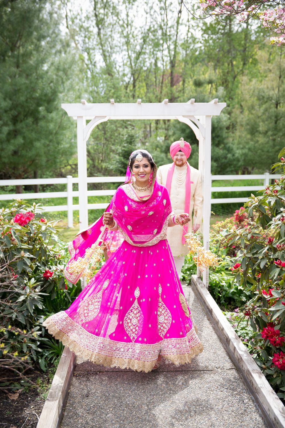 Photo of Fuchsia Pink and Gold Border Lehenga