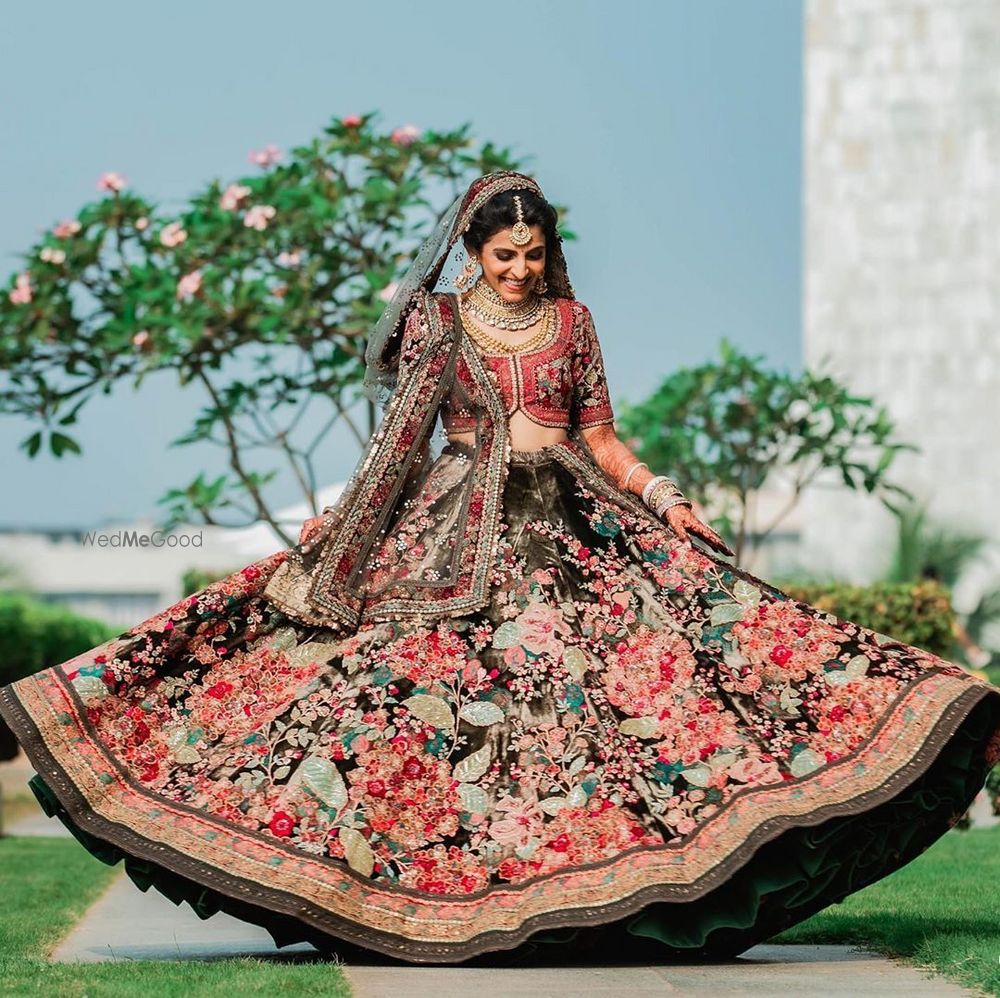 Photo of A beautiful twirling bride portrait.