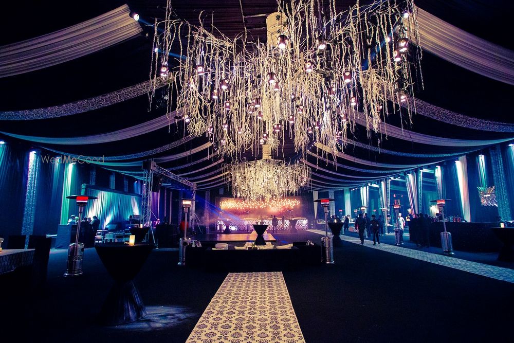 Photo of glamorous club look theme with large chandeliers