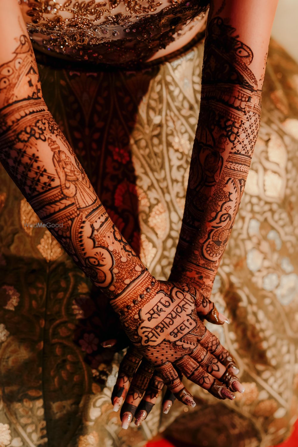 Photo of unique bridal mehendi with words