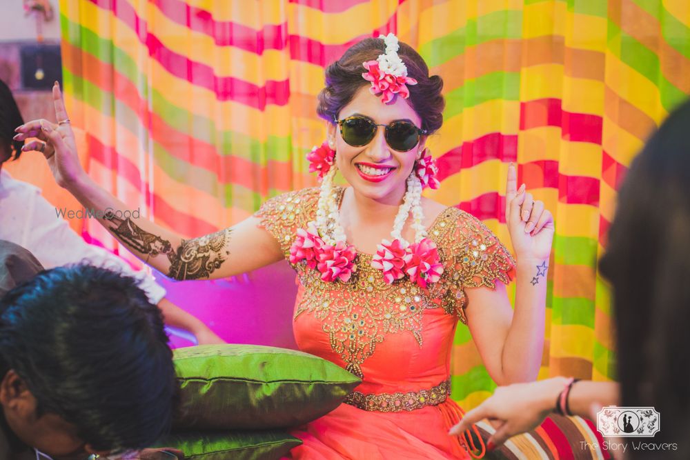 Photo of Bride Rocking Round Shades at Mehendi