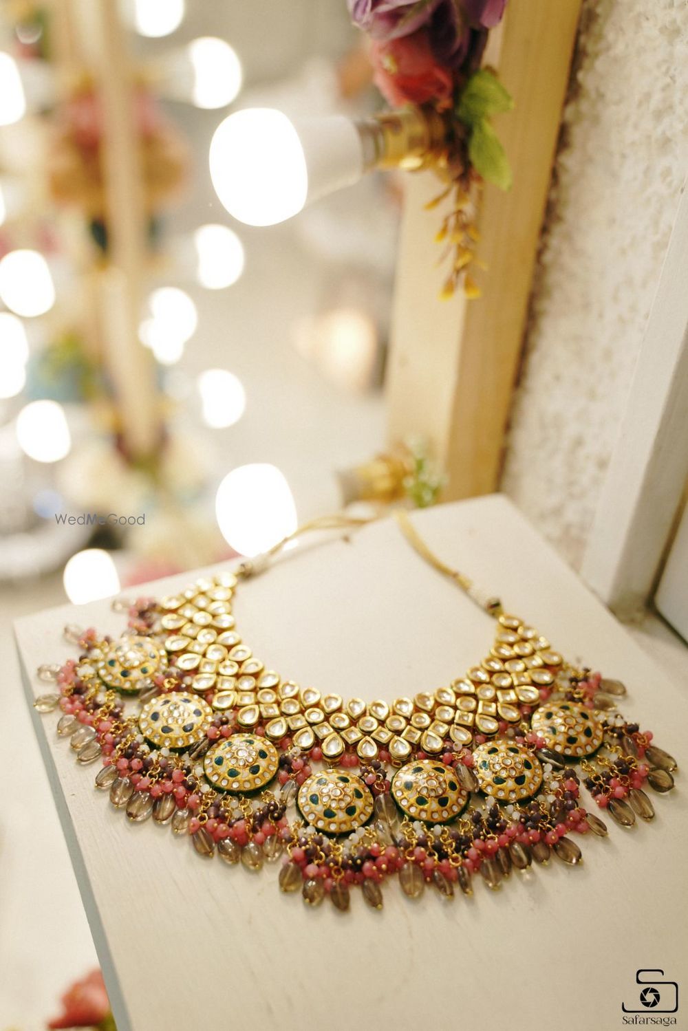 Photo of bridal necklace photography with pink beads