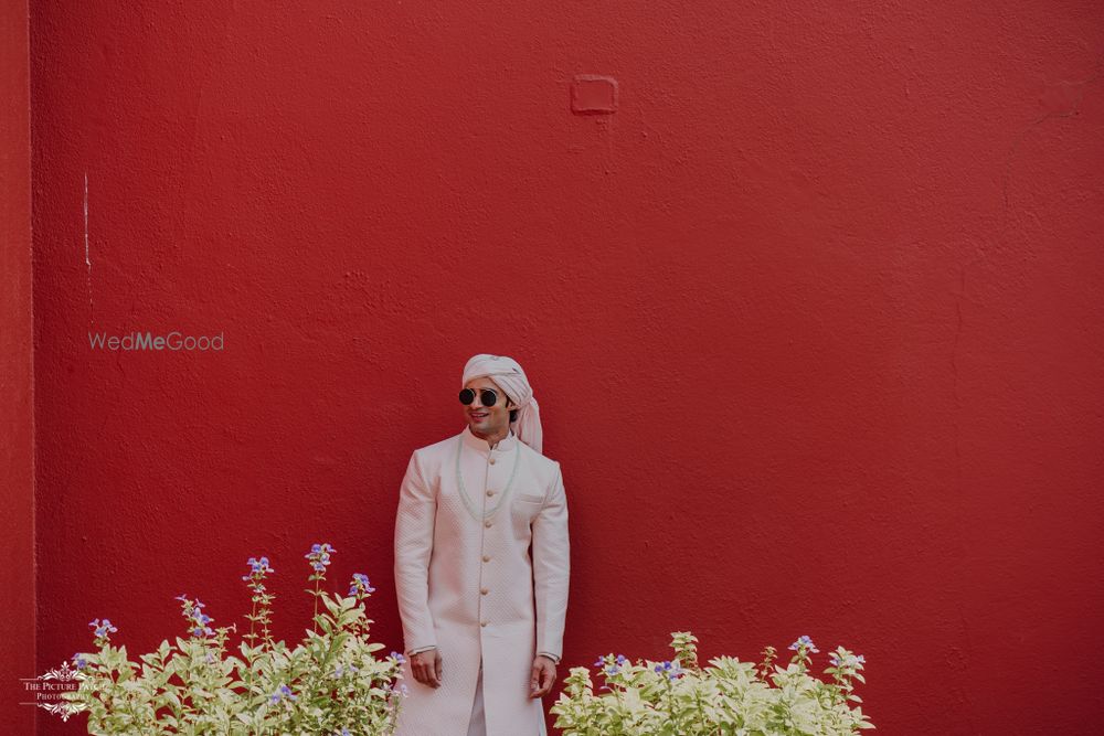 Photo of Groom wearing a pastel pink sherwani