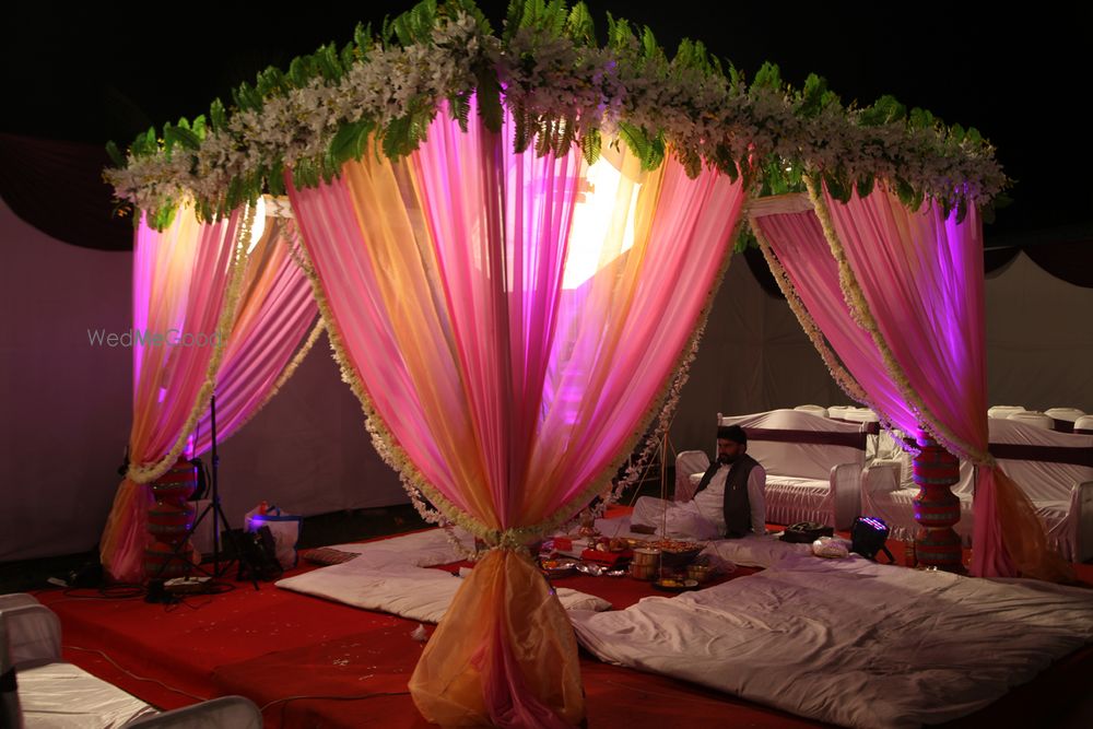 Photo of light pink drapes with light