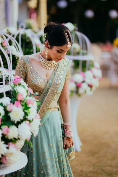 Photo of Bride wearing offbeat Sabya pastel lehenga