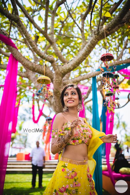 Photo of Unique props and a bride to be in yellow lehenga for her mehendi