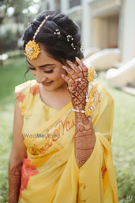 Photo of pretty haldi bridal look with a braided hairstyle