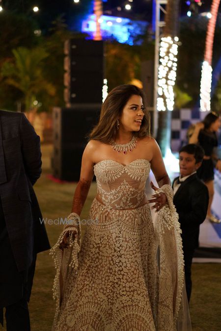 Photo of strapless manish malhotra nude and ivory cocktail gown