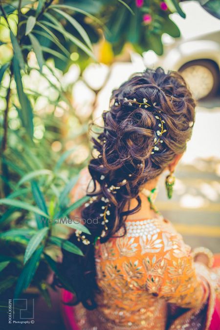 Photo of Messy princess braid with babys breath