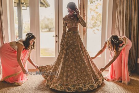 Photo of Bride getting ready with bridesmaids