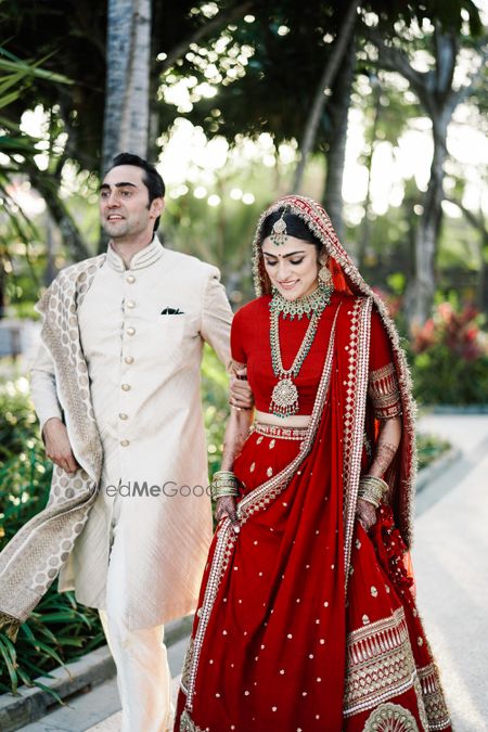 Photo of Bride and groom together, in traditional colours