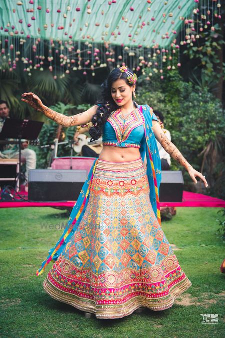 Photo of Bright mehendi lehenga quirky