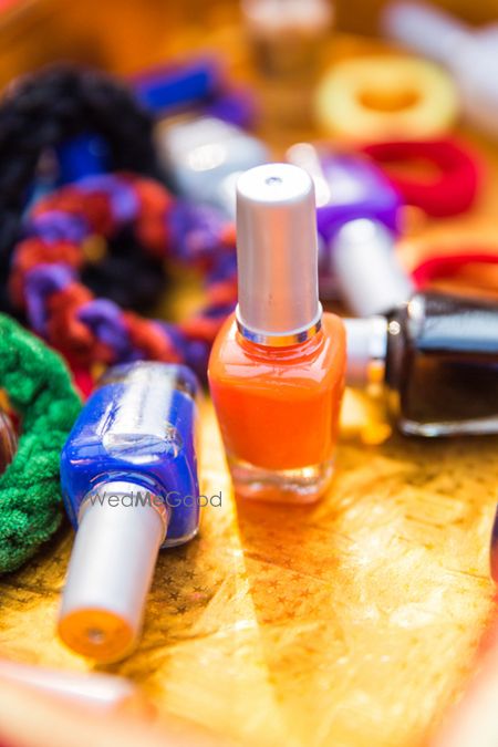 Photo of Nail polishes given as mehendi favors in potlis