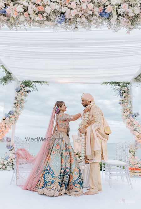 Photo of couple during varmala on wedding day