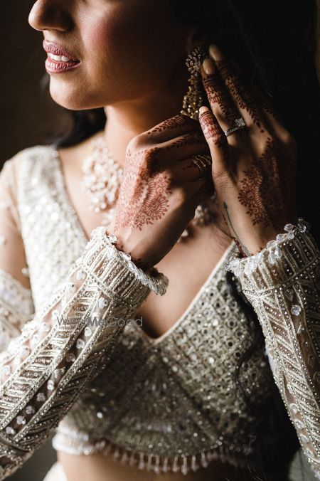 Photo of Bridal details of her modern reception look