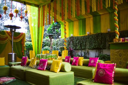 Photo of Colorful Mehendi decor in pink and yellow