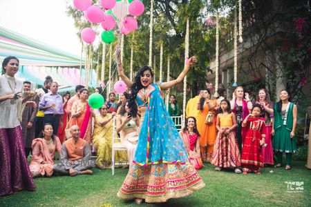 Photo of Happy bride shot in outdoor mehendi