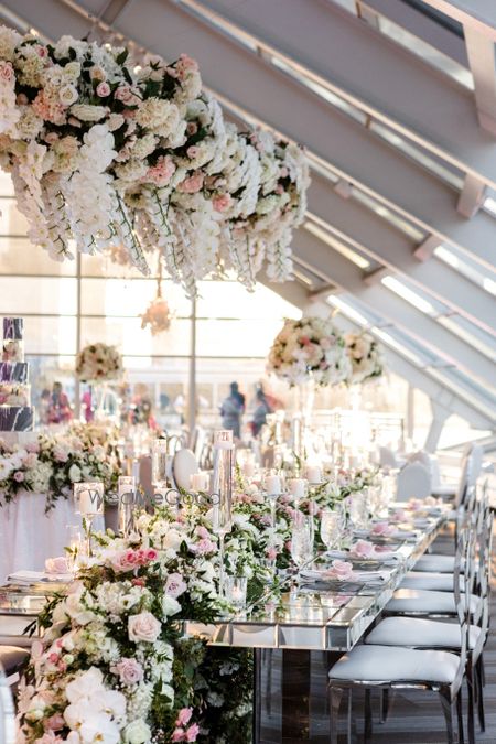 Photo of Table settings decor for an Indian reception