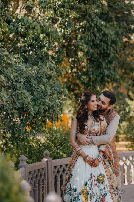 Photo of cute couple portrait on mehendi day