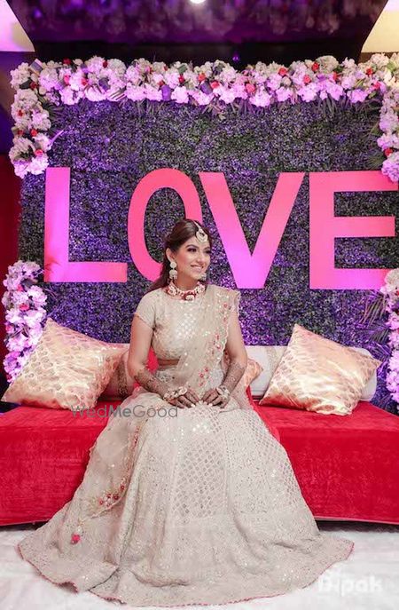 Photo of Bride in beige for mehendi