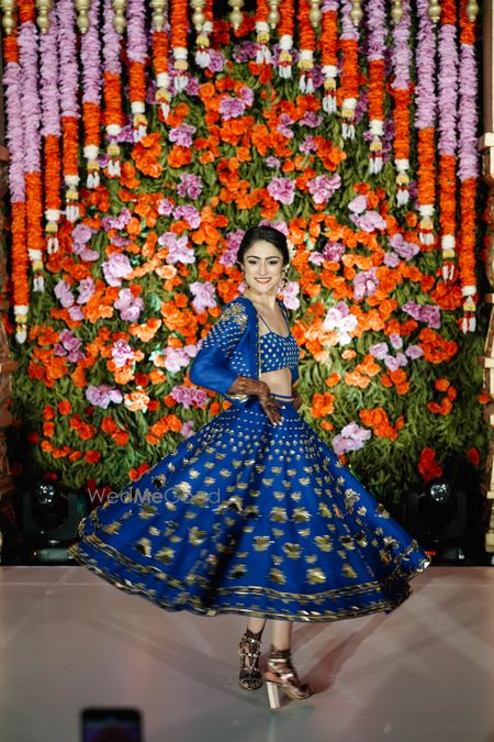 Photo of Bride twirling on her mehendi