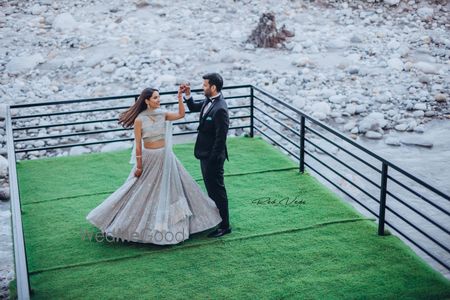 Photo of A couple in coordinated clothes for their engagement