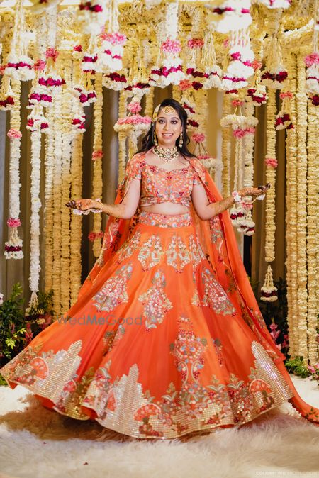 Photo of Twirling bride on mehendi