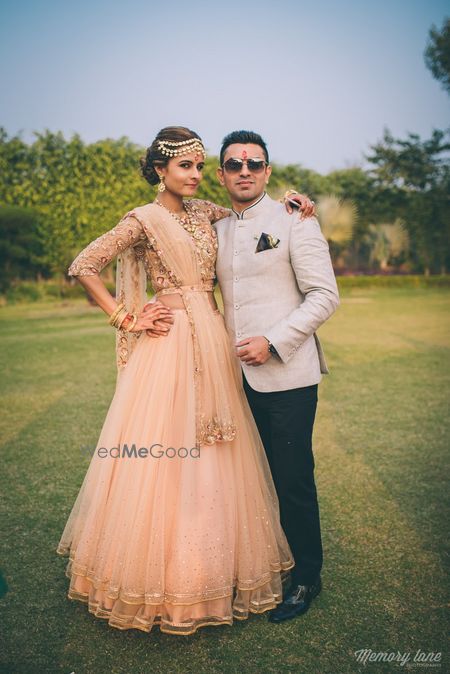 Photo of Peach engagement lehenga on bride