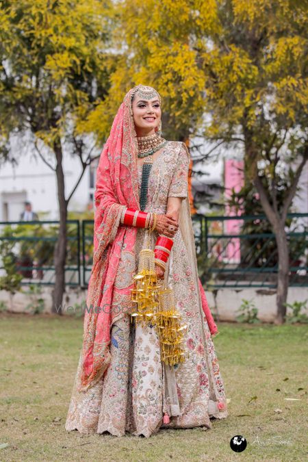 Photo of Pastel Heavy Embroidered Bridal Lehenga