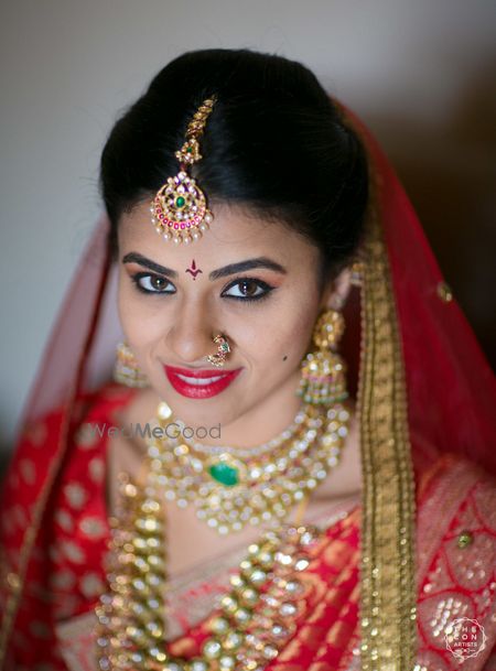 Photo of South Indian bridal look and jewellery in red