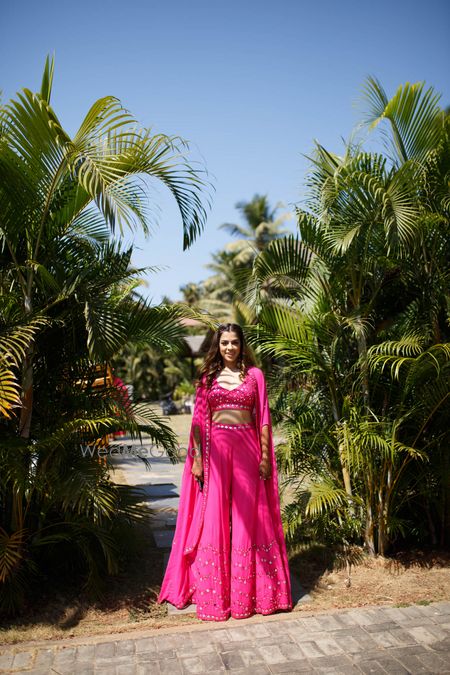 Photo of bright pink indo western outfit for summery mehendi