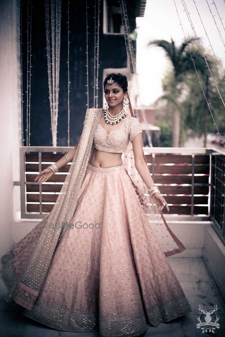 Photo of Soft pink elegant bridal lehenga by Sabyasachi