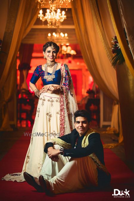 Photo of Bride in Blue and White with Brother Shot