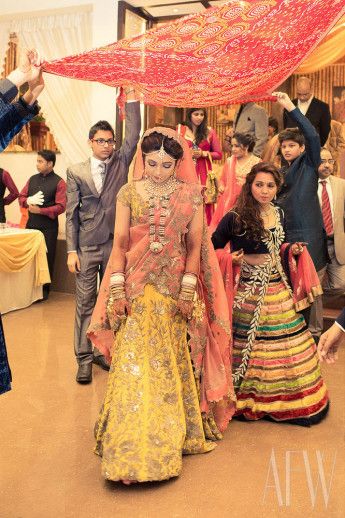 Photo of yellow and pink lehenga