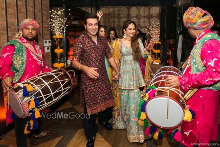 Photo of A fun couple entry on the dhol night