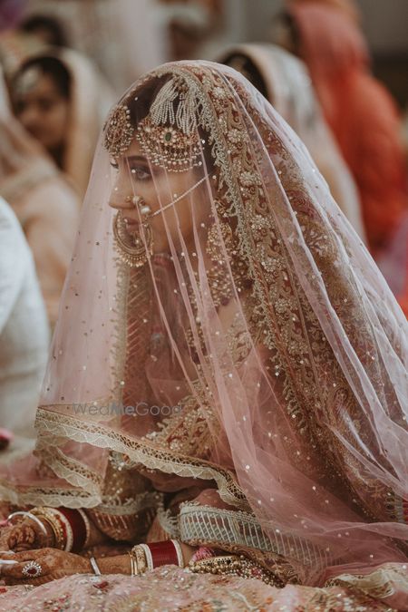 Photo of bride in lehenga during anand karaj