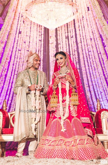 Photo of A happy couple shot taken before the jaimala ceremony.