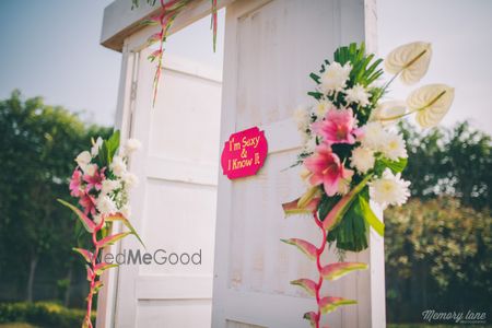 Photo of White wooden doorway entrance in garden engagement