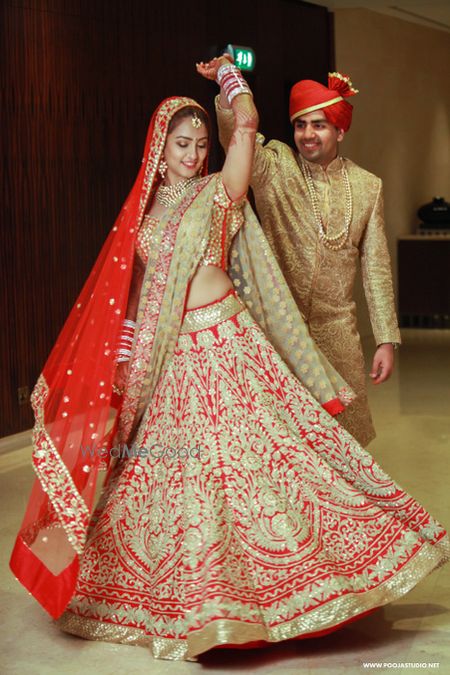 Photo of Red all over embrpidered bridal lehenga