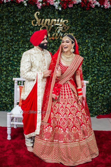 Photo of A candid shot of the couple clicked after their wedding